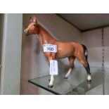 A ceramic horse made in Western Germany embossed 2174 to base