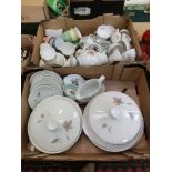 Two trays of ceramic ware to include a part Royal Doulton dinner set 'Tumbling Leaves'