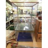 A perspex display cabinetDimensions: H: 78cmW: 39cmD: 38cm