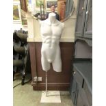 A white mannequin torso