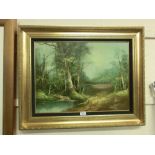 A gilt framed oil on canvas of wooded countryside scene signed bottom right 'Terry'