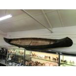 A fibreglass Native American style canoe (For decoration only)