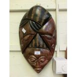 A carved wooden African mask