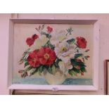 A framed oil on board of still life signed Doris E Luxton