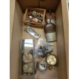 A box containing miniature hip flask, military badges, watches, collar studs etc.