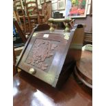 An Edwardian oak front coal box with lift-up lid