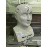 A ceramic phrenology head marked to base 'Phrenology By L.N.Fowler'