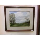 A framed watercolour of river scene signed Alan Ward