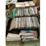 Two trays of 45 rpm records by various artists