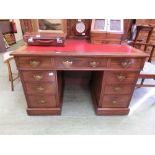 An early 20th century twin pedestal desk