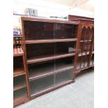 A mid-20th century glazed four tier bookcase