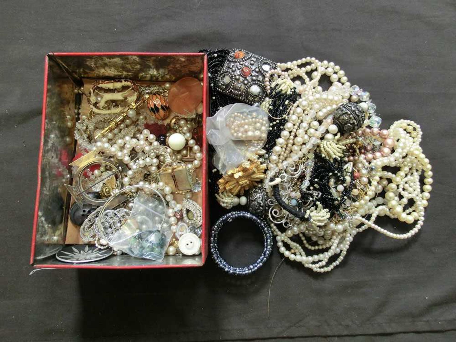 A box containing a quantity of costume jewellery