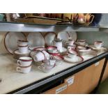 A selection of red and white gilt edged tableware, mainly by Spode and Royal Worcester, to include