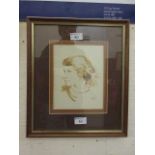 A framed and glazed possible watercolour of young lady