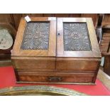 An early 20th century oak desktop stationery cabinet