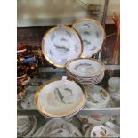 Fourteen ceramic plates with fish design marked to base Czechoslovakia