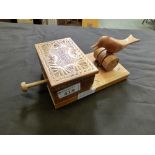 A hand crafted mechanical cigarette box with bird