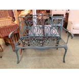 A cast aluminium green painted garden bench