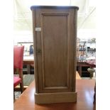 A stripped mahogany pot cupboard