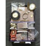 A leather bound jewellery box containing an assortment of yellow metal cuff links, a bracelet marked