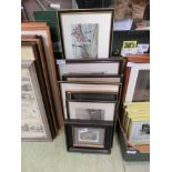 A collection of framed prints mainly on a building theme