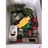 A box containing old diecast toys to include military and agricultural vehicles etc.