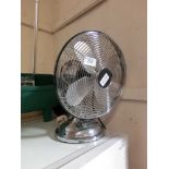 A chrome desktop fan