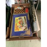 A tray containing children's toys and games to include building sets, loom set, crossword, etc