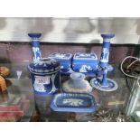A selection of blue and white Jasperware style ceramics, mostly by Wedgwood to include candlesticks,