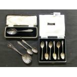 A cased set of silver hallmarked spoons along with a cased silver hallmarked spoon and three others,