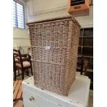 A wicker laundry basket