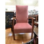 A peach draylon upholstered open armchair