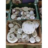 Two trays of decorative ceramic tea ware, plates etc.