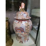 An oriental large lidded vase