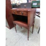 A reproduction flame mahogany cabinet having single drawer above open storage