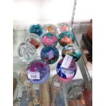 A selection of eleven limited edition Caithness paperweights