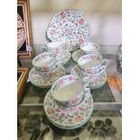 A selection of Minton 'Haddon Hall' tableware to include cups, saucers, cream jug, etc