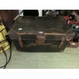 An old canvas travelling trunk