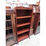 A reproduction mahogany bookcase