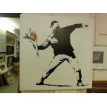 A stretched canvas after Banksy
