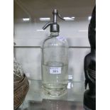 A glass soda siphon with 'Job Wragg Ltd Birmingham 1919' engraved to lid