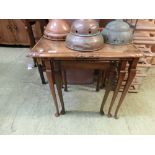 A nest of three walnut occasional tables (A/F)