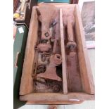 A wooden box containing three old car jacks etc.