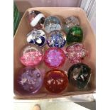 A collection of twelve glass dumps