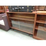 A mid-20th century glazed teak bookcase