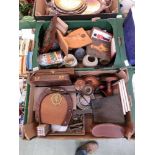 Two trays of assorted collectibles to include wooden candle sticks, binoculars, horse brasses,