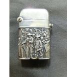 An embossed mid-20th century Swiss petrol lighter