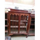 An early 20th century mahogany glazed display cabinet