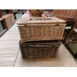 Two wicker picnic baskets, one by Fortnum and Mason