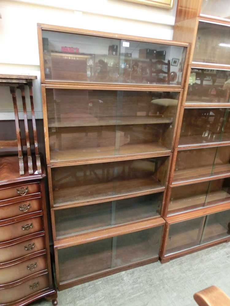 A mid-20th century four section glazed bookcase